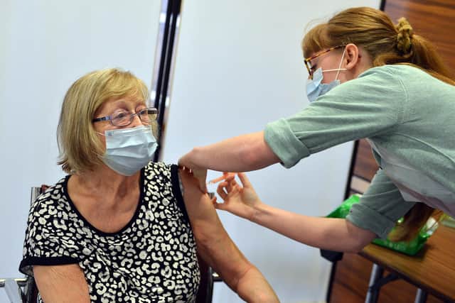 Sheila Wood having her jab from vaccinator Lara White at Chesterfield's Casa Hotel earlier this year