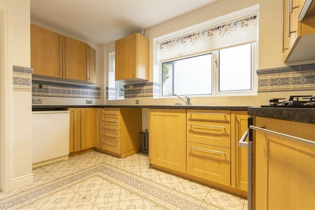 The kitchen is fitted with beech wall, drawer and base units. Integrated appliances include an electric oven  and four-ring gas hob. There is space and plumbing for a washing machine and space for an under counter fridge.
