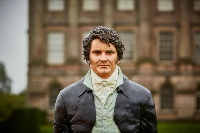 EDITORIAL USE ONLY. A life-sized cake of Mr Darcy, as played by Colin Firth in the TV mini-series of Pride and Prejudice, has been unveiled today at Lyme Park, Cheshire in the 25th anniversary year of the iconic series.