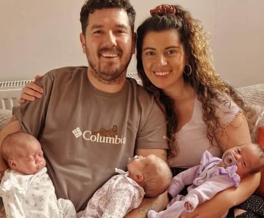 Jamie Revill and Giorgia White with triplets Atlanta, Bella and Rain who have made their family complete.