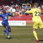 Chesterfield's Marc-Antoine Fortune tries to get on the end of a long ball during the last match between the two sides on 19/04/19.