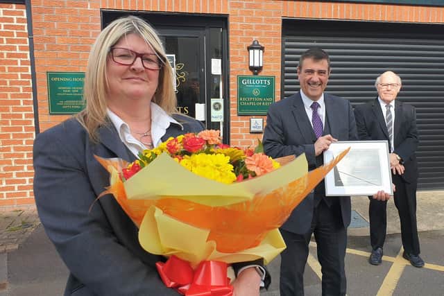 Helen Ellis celebrates her 25th year working for Gillotts Funeral Directors in Heanor, along with partners Anthony Topley and Barry Hutsby.