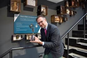 Charles Hanson backs the Adopt an Object campaign by choosing a Derbyshire Blue John fluorite paperweight with a gilded 1826 shilling.