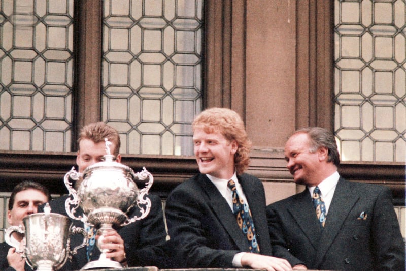 Phil King and Ron Atkinson on the Sheffield Town Hall balcony with the cup.