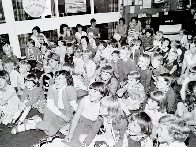 Children seen enjoying a Punch and Judy show in Ripley, August 1981.