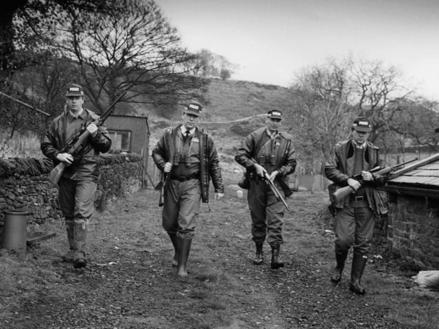 Derbyshire Police's firearms unit tracking a big cat known as the Beast of Ollersett Moor, near New Mills 1989.