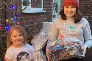 Delivery Elves Poppy and Lexi Bradshaw with hampers for elderly people in Shirland and Higham.