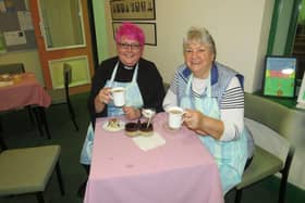 Jill Hancock, Priest-In-Charge of Holy Trinity Tea and Toast Café, with Audrey Musson, a volunteer who cooks hot meals, soup and cakes.