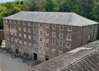 Cromford Mill, buildings 1,18, 26 and aqueduct are in a very bad condition. Building 18 is the original mill and the upper storey is unoccupied and dilapidated with a lightweight roof structure and asbestos covering that is failing. Historic England awarded the Arkwright Society Covid 19 Emergency Response Fund grants to address loss of revenue and subsequently a project development grant to assess re-roofing options. The society has been encouraged to apply for further grant aid for 'interim' re-roofing.