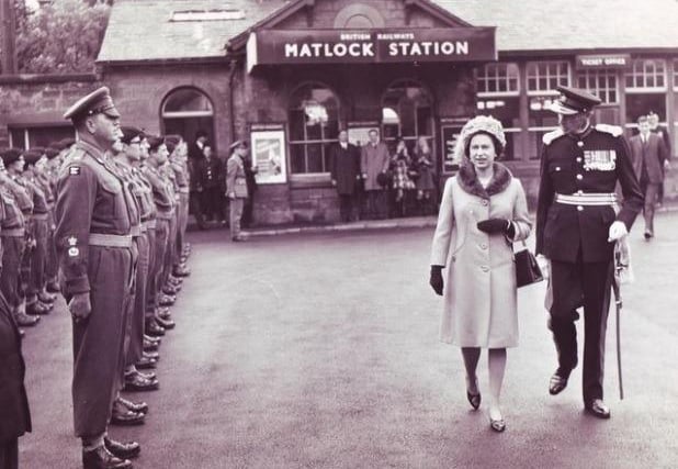The Queen is accompanied by the Lord Lieutenant, Sir Ian Walker-Okeover, as they walk past a contingent of the Leicestershire and Derbyshire (PAO) Yeomanry at Matlock station.