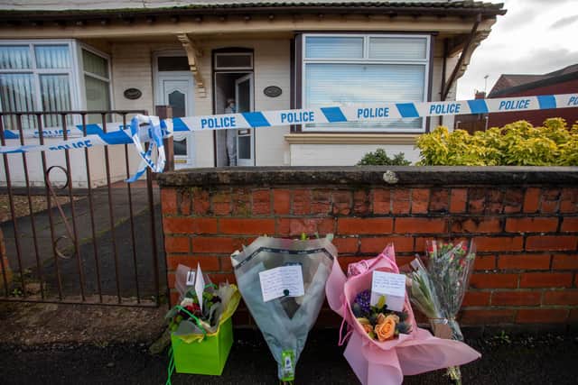 Flowers at the crime scene on Station Road, Langwith Junction.
