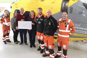 Club Captains Fiona Stephenson and John Bennett were invited to the Nottingham Heliport base of  the air ambulance service to present the cheque