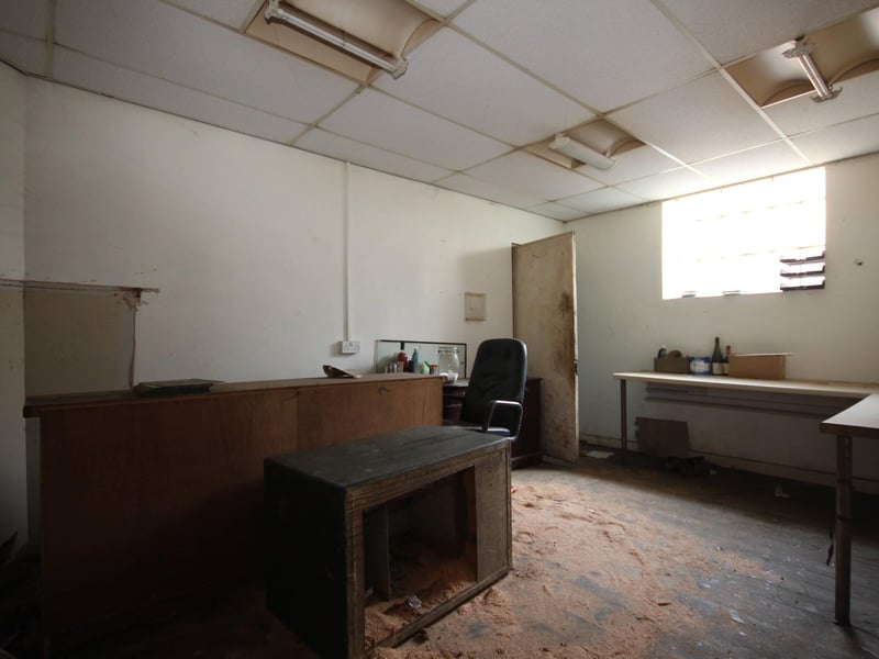 An office/store room inside the former chapel.