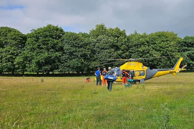 The woman was airlifted to hospital. 
Credit: Edale MRT
