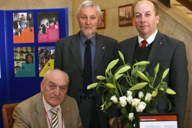 Chesterfield Cllrs. signing Holocaust book l to r Cllr.John Burrows,Cllr. Ray Russel,Borough council C E Hew Bowen