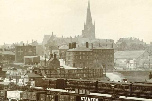 This photo, taken by CH Nadin around 1910, shows why the building was originally called the Station Hotel. It can be seen with the Midland Railway Station in the foreground