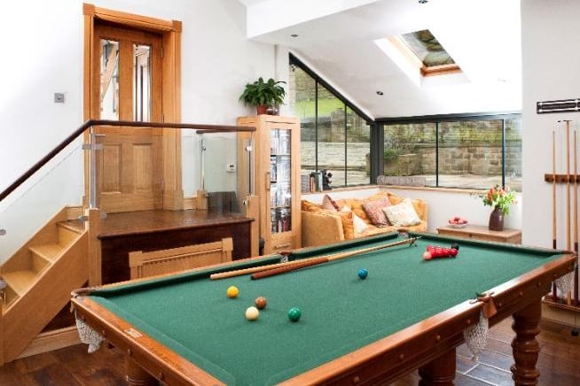 The games room includes access through to a store room and the adjoining barn.