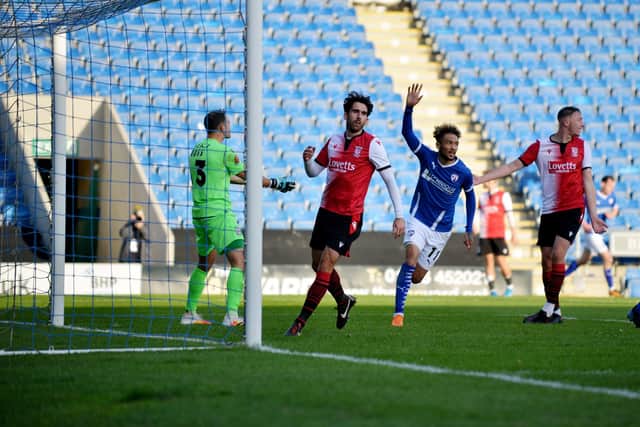 Alex Kiwomya scores his debut goal which put Chesterfield 3-0 up against Woking.