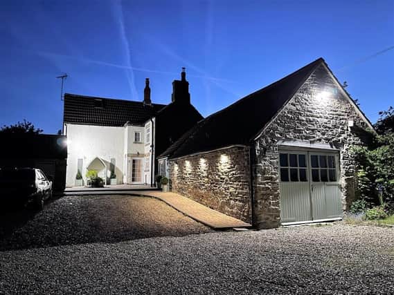 The four-bedroom house has an attached stone-built garage that could be converted into further accommodation.