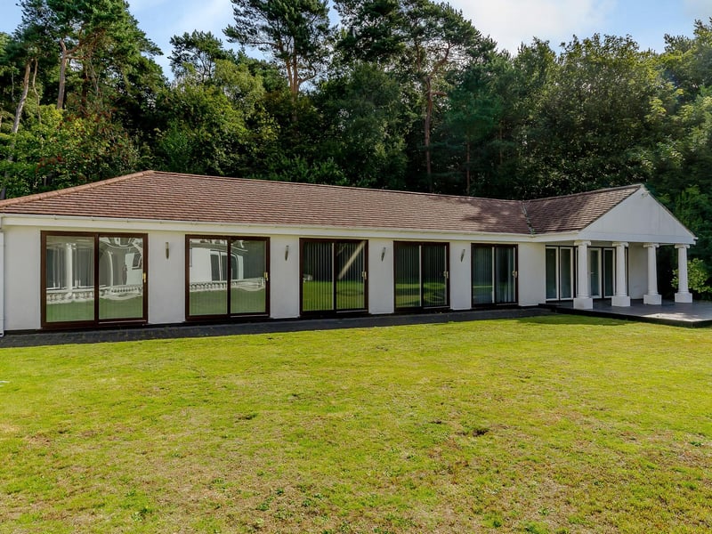 Currently an office, but can easily be converted into further living accommodation and has three en-suite shower rooms