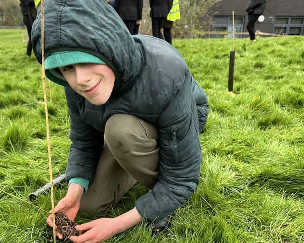 Lees Brook Academy pupils have planted trees in memory of Chris Hunter