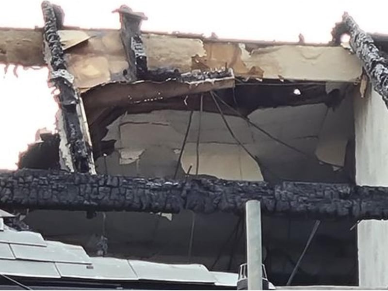Photos show a number of electrical wires in the roof after it was hit by fire.
