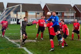 Action from Boot and Shoe (blue) v New Whittington Newbold in the Alma Cup. All photos by Martin Roberts.