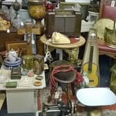 A selection of goods offered for sale on the Heanor Antiques Centre stall at a previous Wirksworth Antiques in the street event.