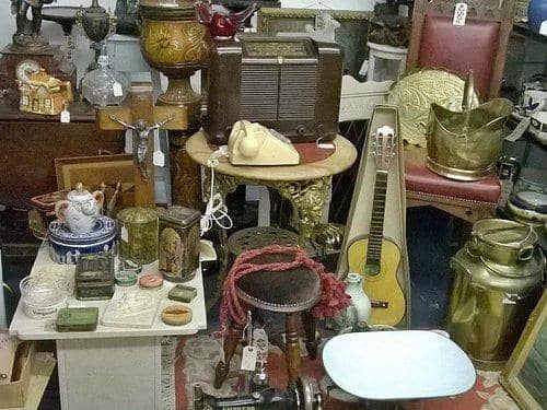 A selection of goods offered for sale on the Heanor Antiques Centre stall at a previous Wirksworth Antiques in the street event.