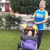 Katie Waine and her son Isaac ahead of the virtual London Marathon.