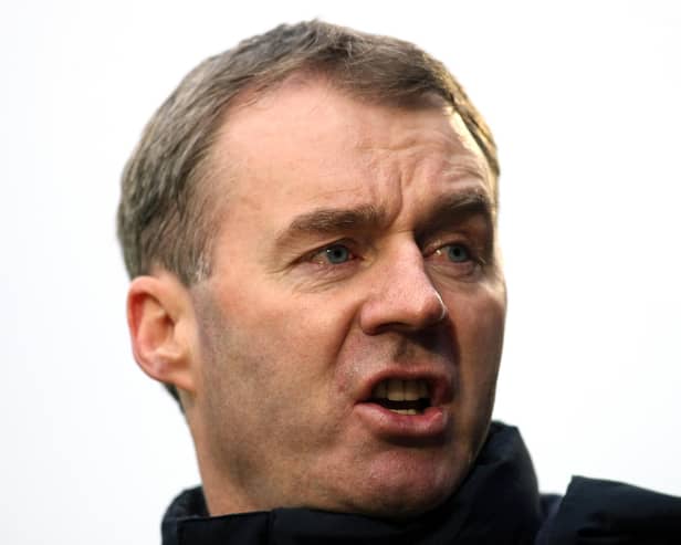 Former Chesterfield manager John Sheridan has been appointed boss of Wigan Athletic
