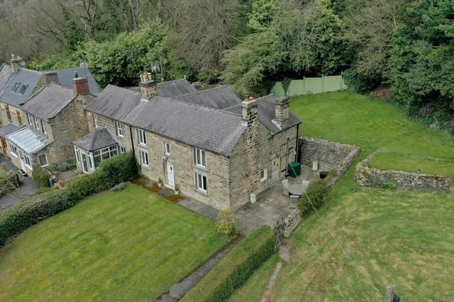 This house in Ashover only has three bedrooms, but also comes with over half an acre of land. It's valued at £899,000.