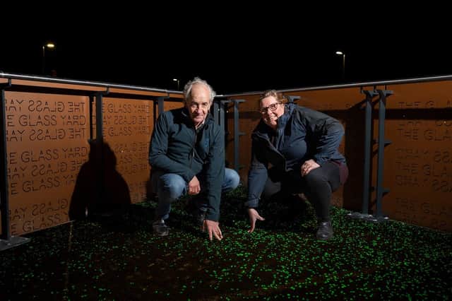 Tim Turner of Blue Deer Ltd and Sarah Newstead of Tarmac Ltd pictured with the glow in the dark pavement