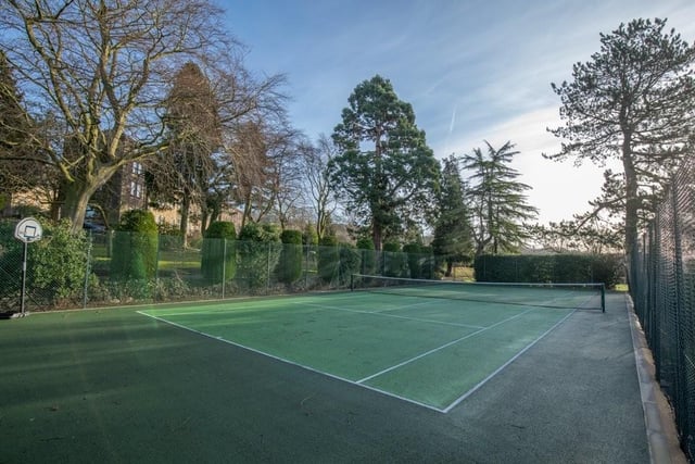 Improve your playing skills on the communal tennis court.