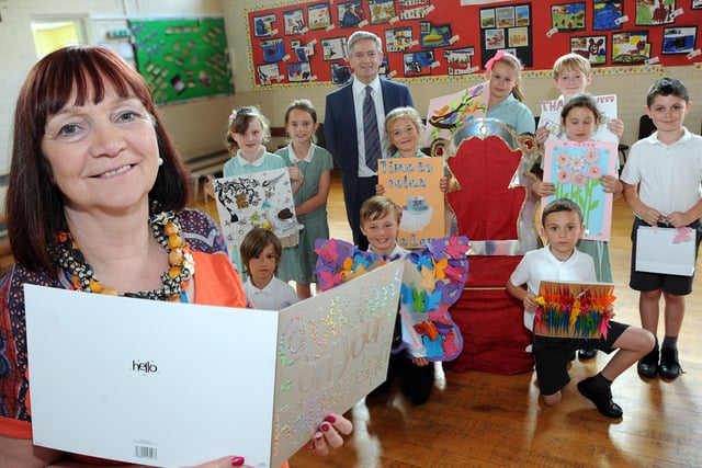 Liz Law is wished a happy retirement from pupils at the St Thomas School in Ilkeston after a special assembly which celebrated her 44 years service.  Also retiring is their head teacher Michael Geraghty who left after 25 years and is pictured with the children who presented gifts at the farewell assembly