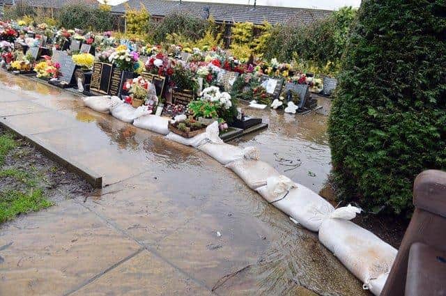 Amber Valley Borough Council says it is 'sorry for any distress caused by standing water in the cemetery'. Pictures taken by Brian Eyre in January.