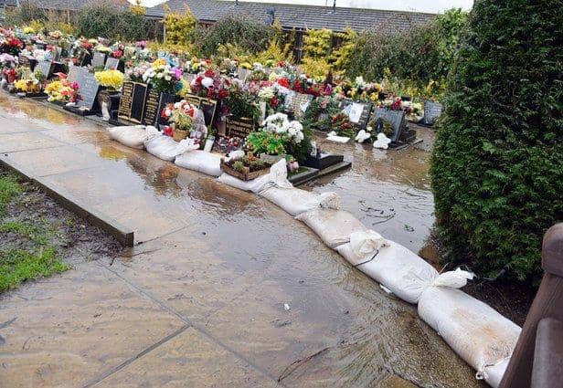 Amber Valley Borough Council says it is 'sorry for any distress caused by standing water in the cemetery'. Pictures taken by Brian Eyre in January.