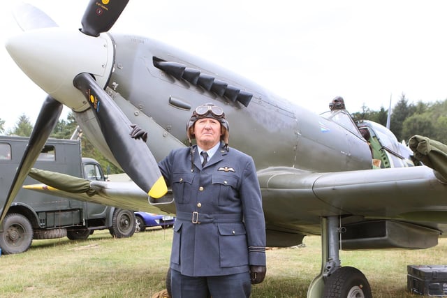 Paul Conybeare with the iconic Second World War aircraft Spitfire Mk IX.