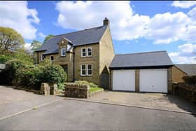 The detached property is in a cul-de-sac in the sought-after village of Bamford.