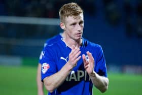 Former Spireites striker Eoin Doyle has joined Bolton Wanderers on a three-year deal.