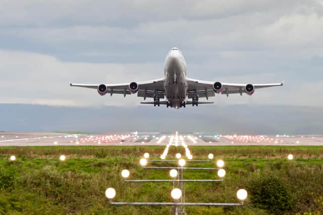 An airplane take off at Manchester Airport.