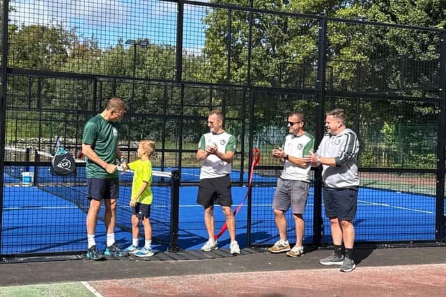 Nick Matthew, left, cut the ceremonial ribbon to open the courts. (Photo: Contributed)