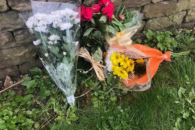 Flowers left on Malvern Road in Chesterfield after the tragedy.