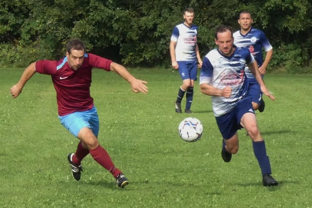 Action from Brampton Moor Rovers' 4-1 win over Britannia Tupton (blue and white) in September.