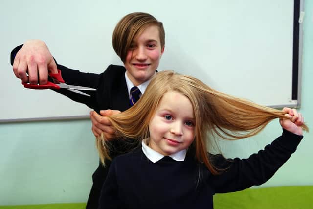 Four-year-old Sonny King is to have his hair cut later this month for the Little Princess Trust and Lily's Legacy in memory of his brother Adam. Seen Sonny with his brother Alex King who will be cutting his hair.