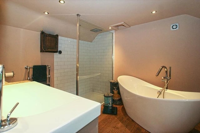 A bath and a separate shower cubicle are contained within the luxurious en-suite accessed from the master bedroom.