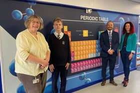 Diana Whitmill, Marko Deksnis, Paul Burrows and Claire Hollingshurst  with the periodic table