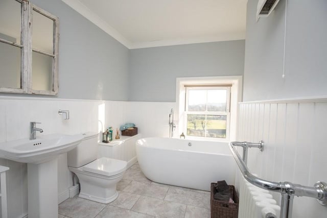 Relax in this well presented bathroom which contains a white suite comprising bath, wash basin, cubicle containing mixer shower with hand-held shower spray, and wc.