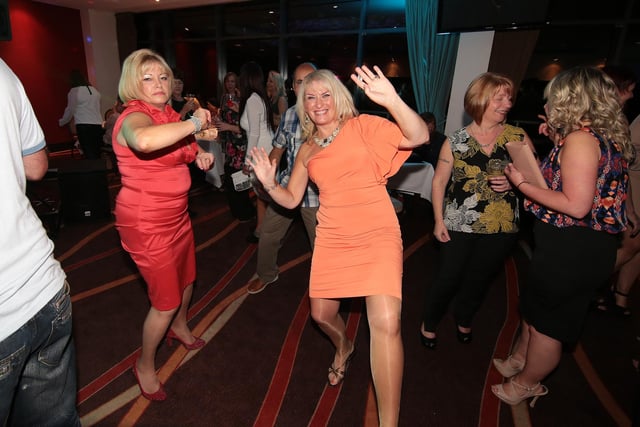 These revellers get into the groove.