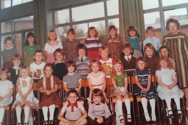 In this school picture, Matt is the boy with bright ginger hair, second left.
